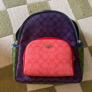 Coach Colorblock backpack in purple, blue, pink, and green. Never used!
